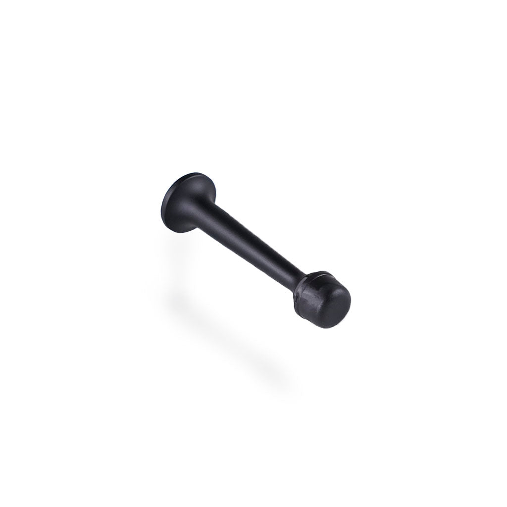 Dørstopper: Dørstopper i massiv messing i mat sort og hætte i sort plast. 78 mm.