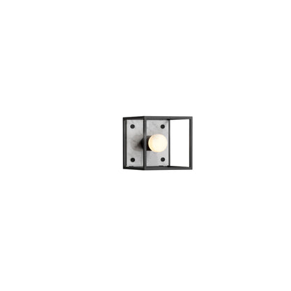 Buster and Punch caged wall lamp small i sort metal med bagplade i hvid marmor.